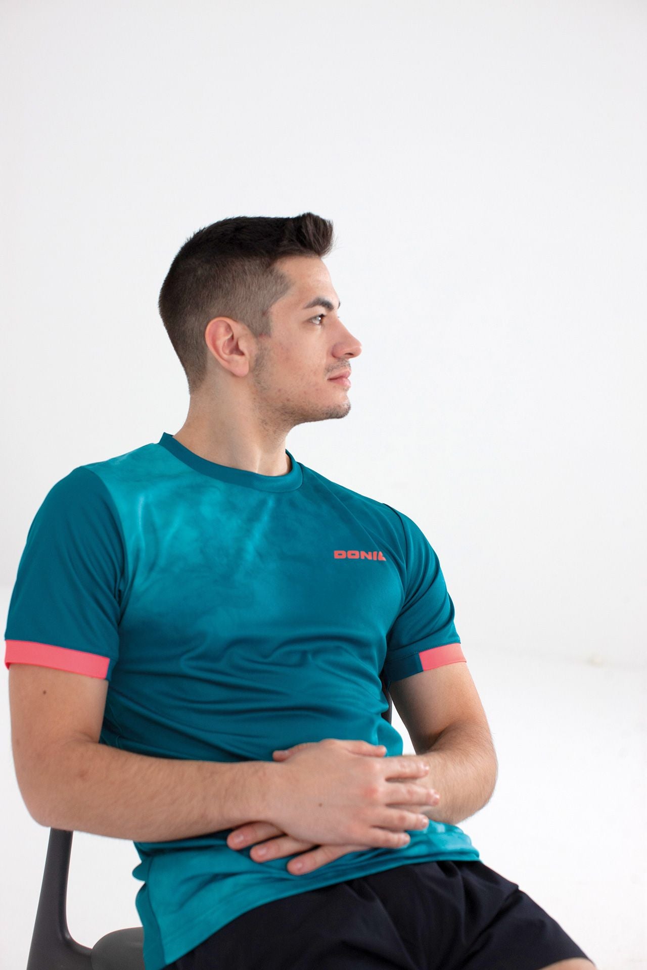 T-shirt Donic Axtion vert/bleu clair/orange